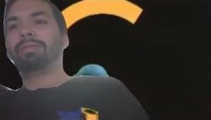employee having a fun chat over zoom, as part of a patchwork of employees that were part of that conversation